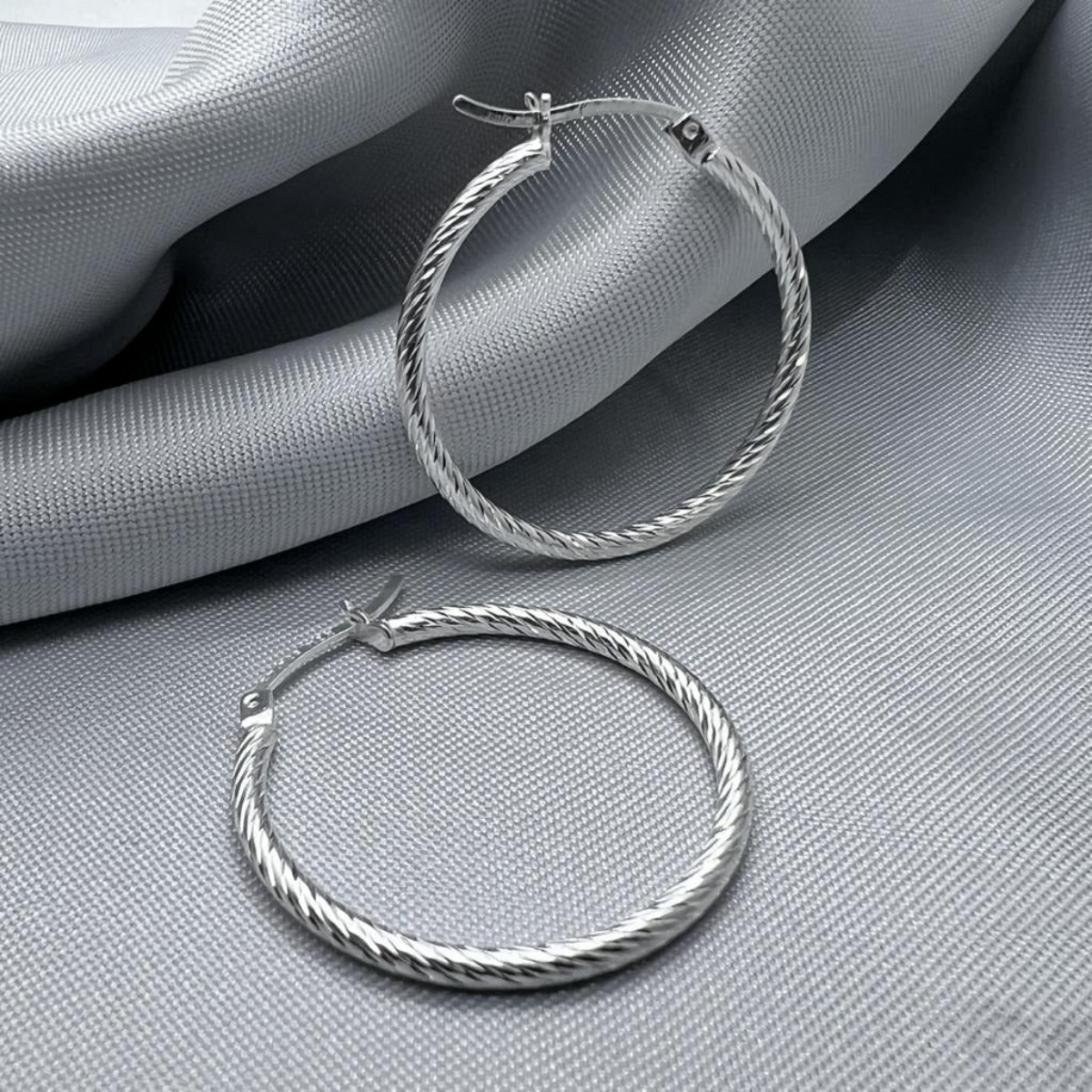 ARRACADAS DIAMANTADAS DE PLATA